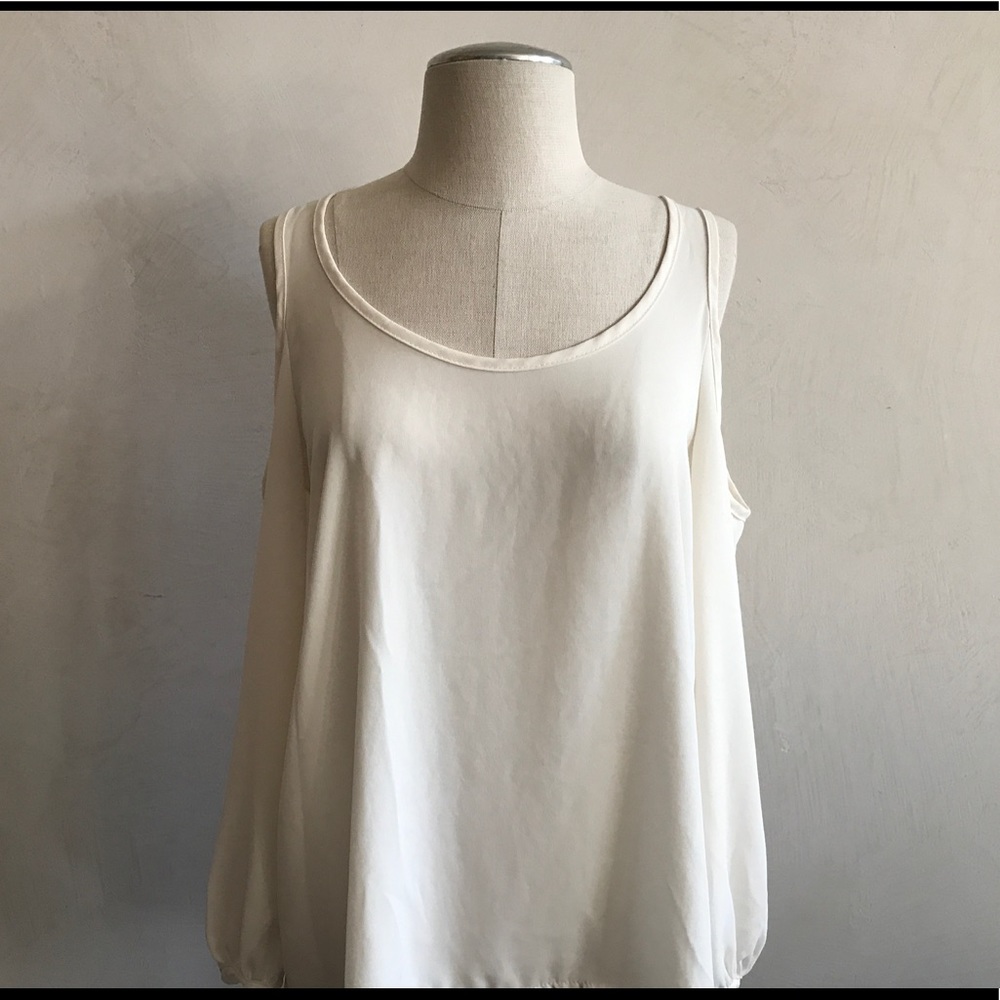 White blouse with shoulder cut out
