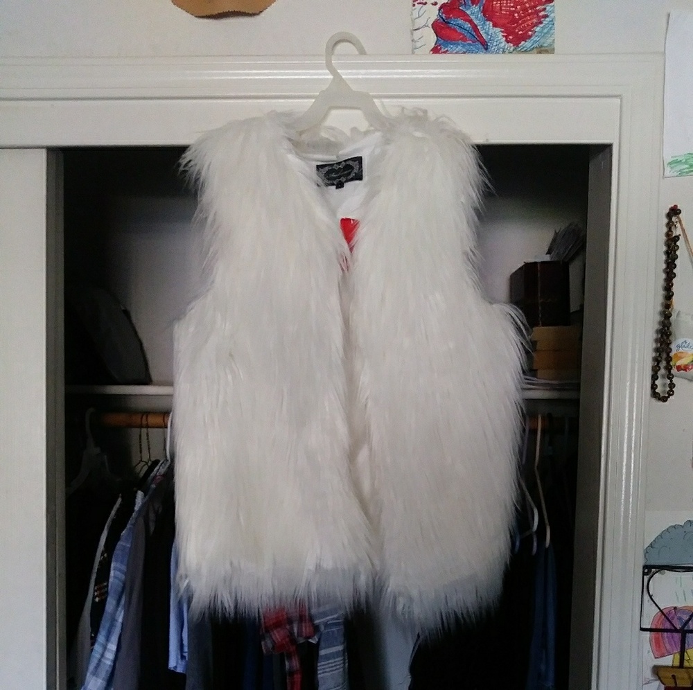 White fur vest