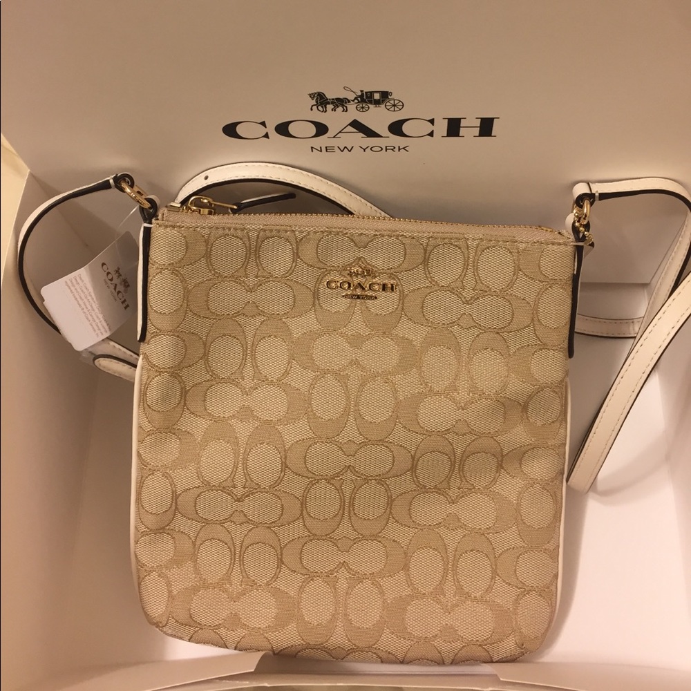 NWT Coach signature cross body purse light khaki