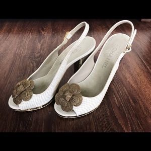 CHANEL chunky gold sling back