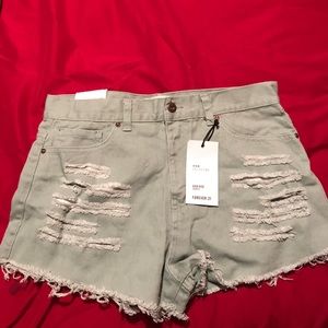 Green high rise jean shorts