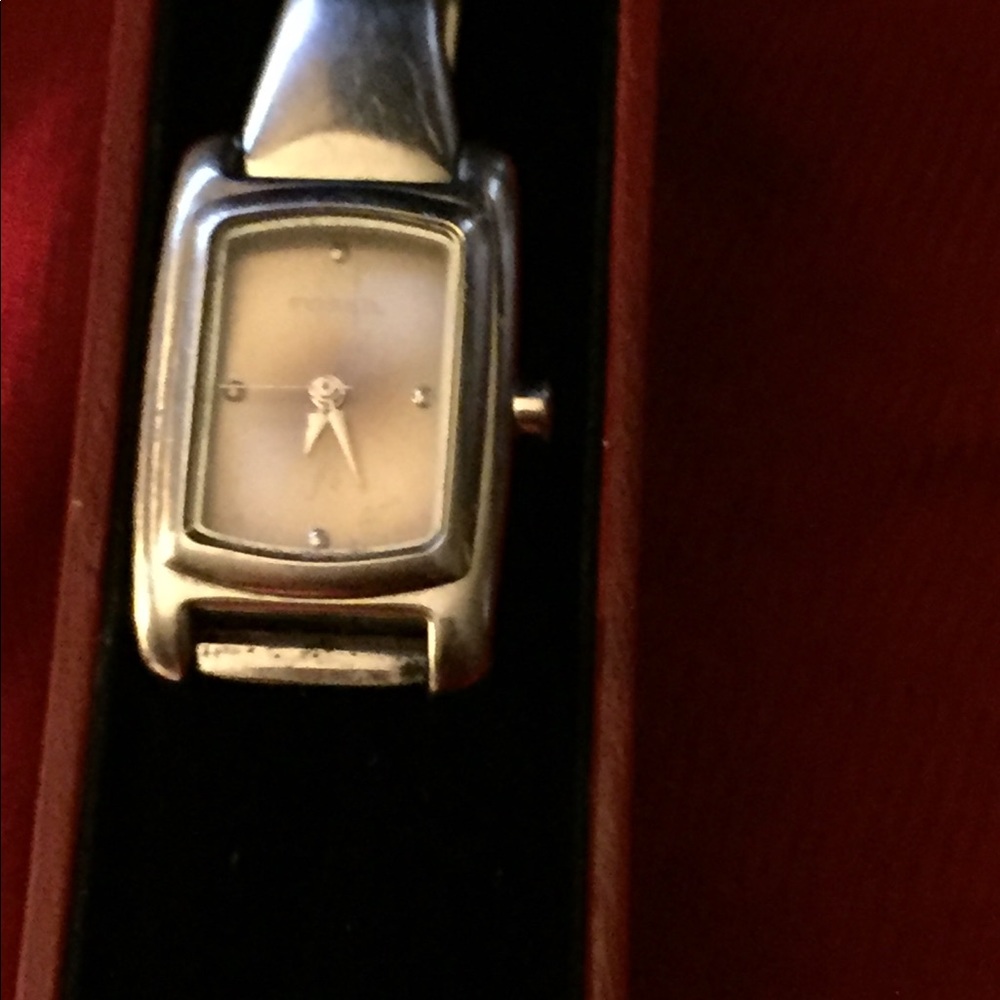FOSSIL Stainless Steel watch is for a XS wrist..