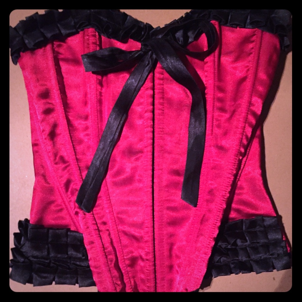 Red satin corset with black trim