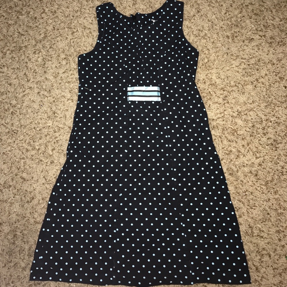 A little girls dress with poka-dots