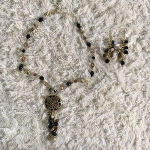 Black, brown, gold necklace and earrings