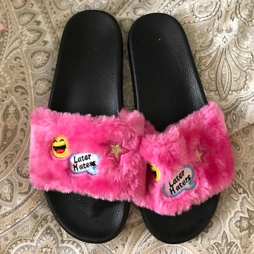 Pink furry emoji slides