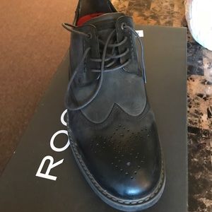 Wingtip shoes worn once.