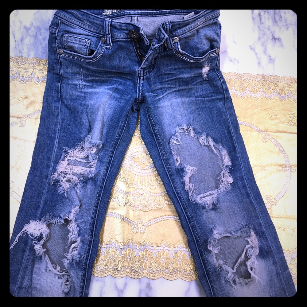 Machine very distressed jeans
