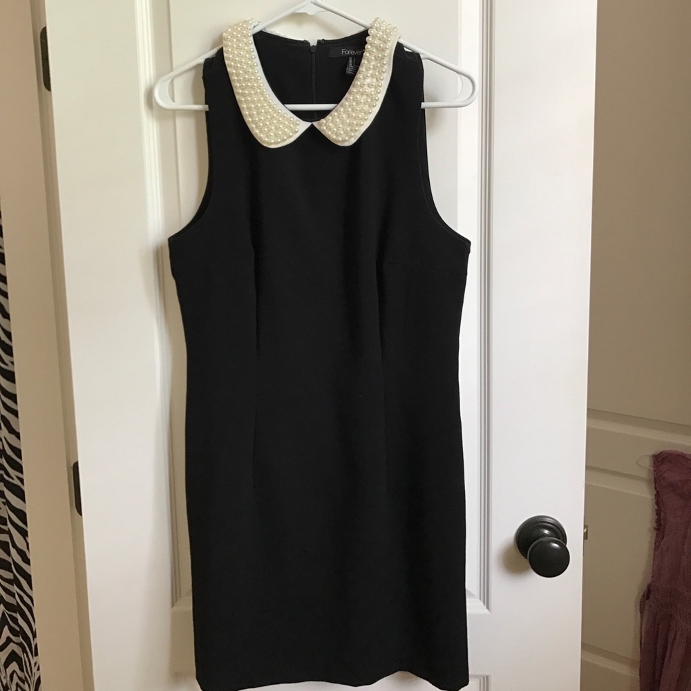 Black dress with pearl collar