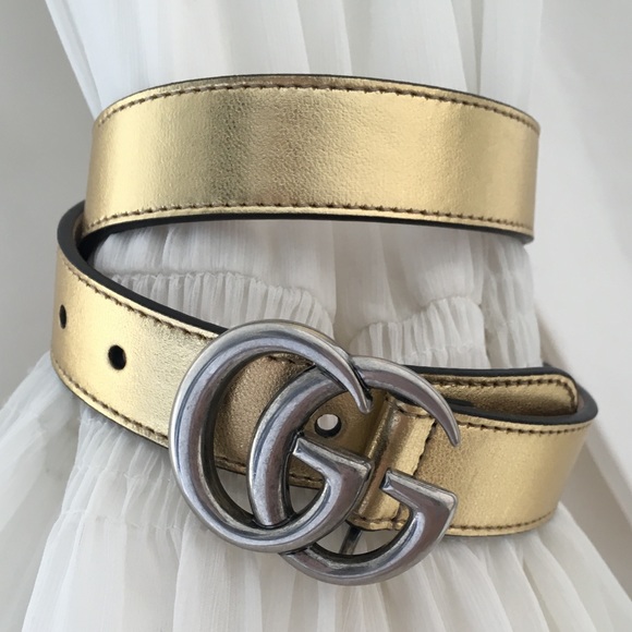 gold and silver gucci belt