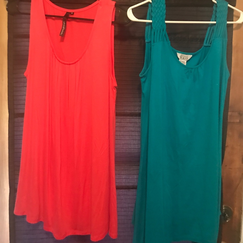 Two tunic length tank tops never worn