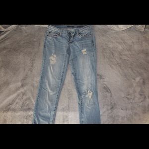 Distressed jeans.