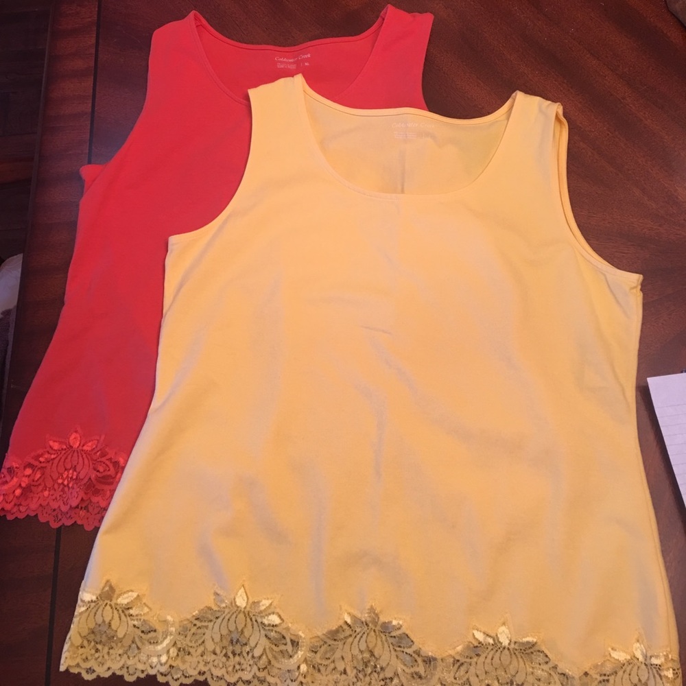 Yellow and coral shell tanks
