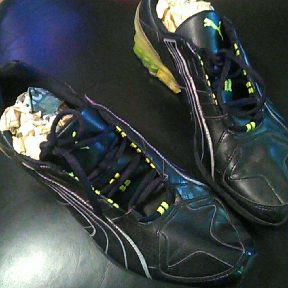 PUMA black leather sneakers
