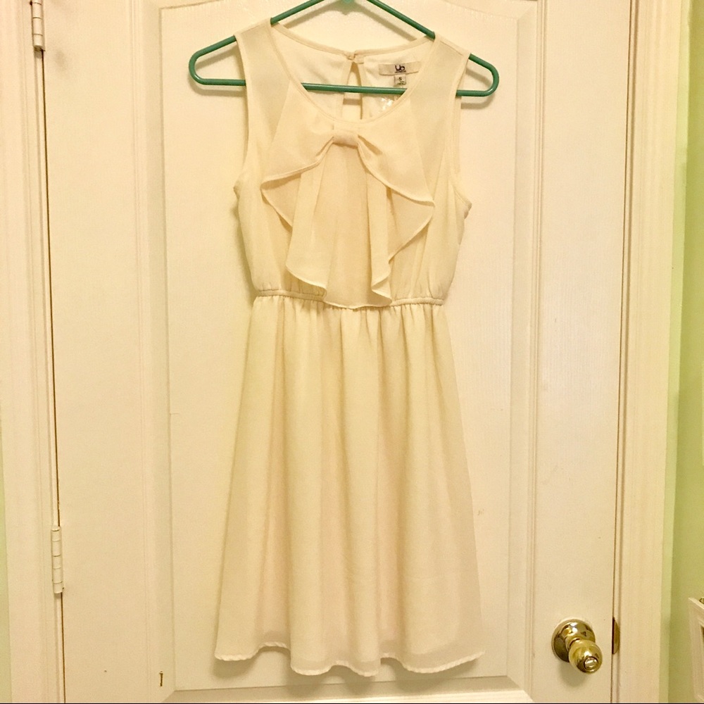 NWT ivory dress with bow in front