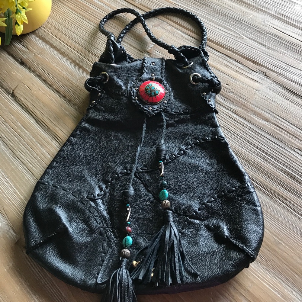 Handmade leather unique shoulder bag. Price firm.