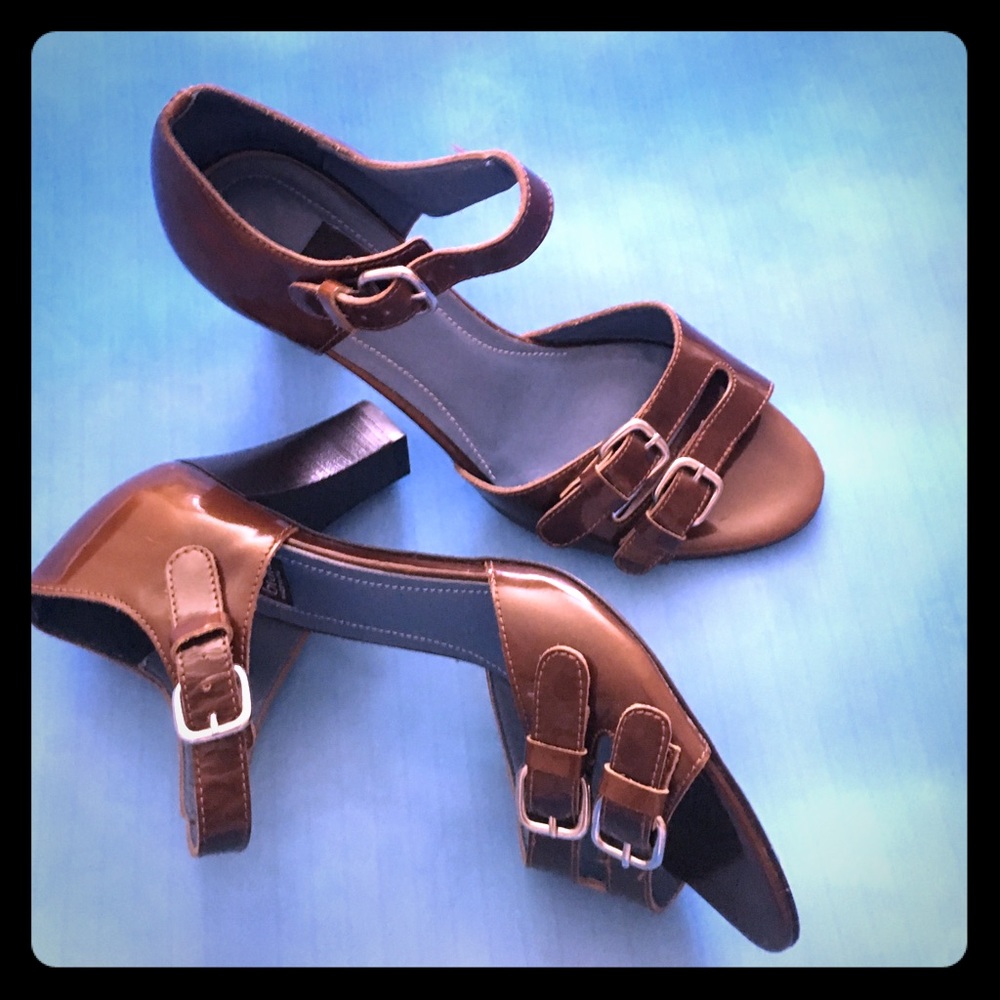 Never been worn brown heeled Biala shoes.