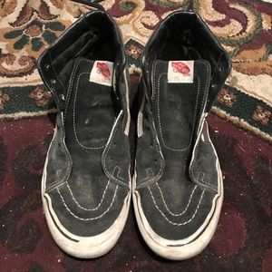 black hightop Vans sneakers