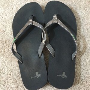Bronze Sanuk flip flops