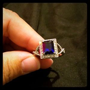 Free with purchase silver ring with blue stone