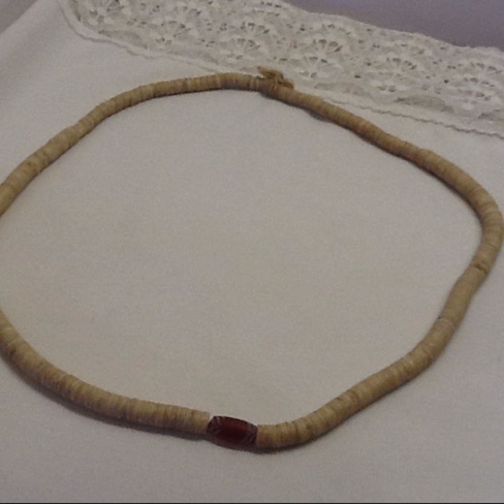 Vintage shell necklace hangs 13" slips on