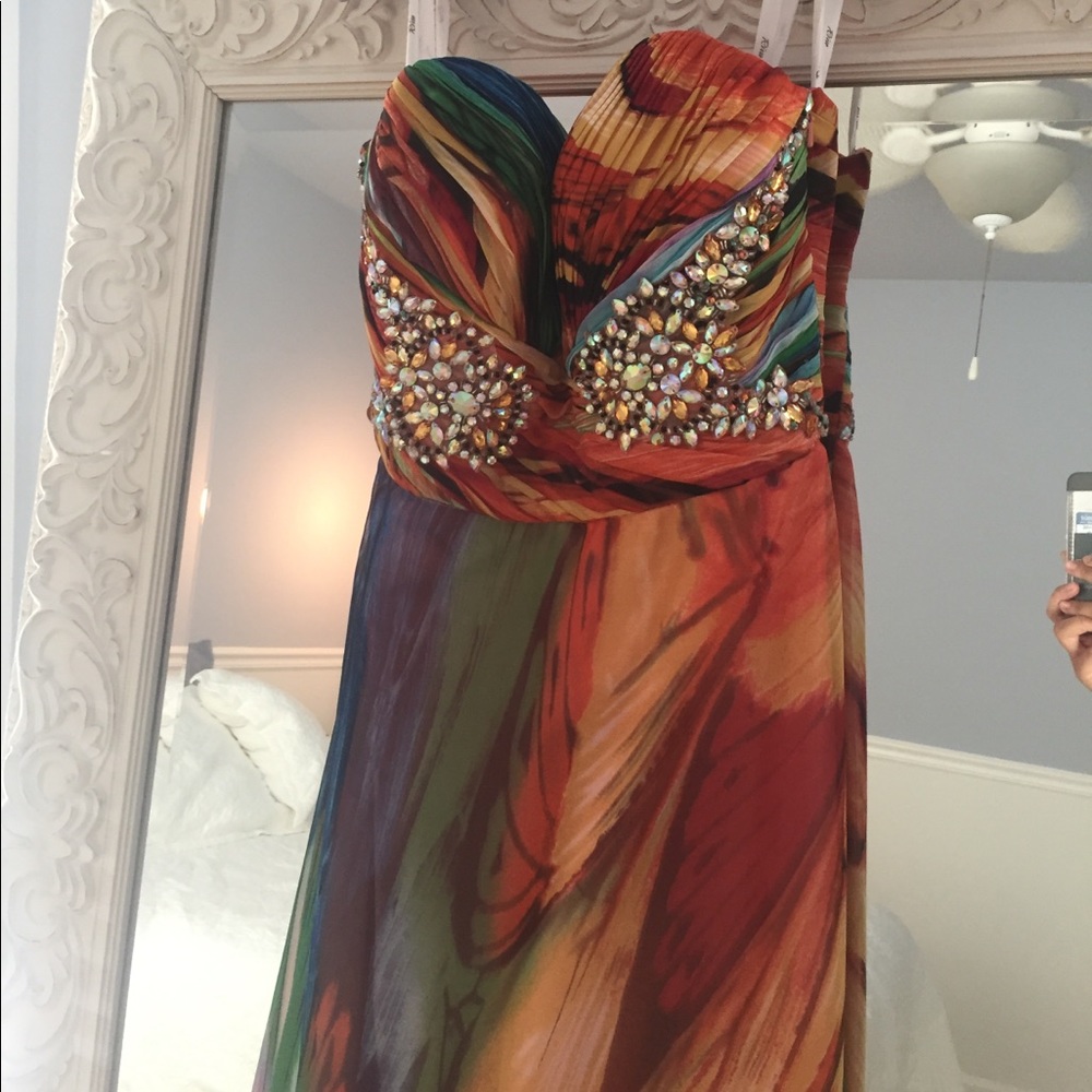 Riva designs butterfly wing pattern prom gown