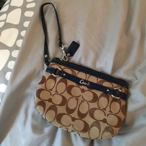 A Coach wristlet