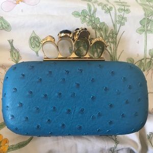 Light peacock blue clutch.