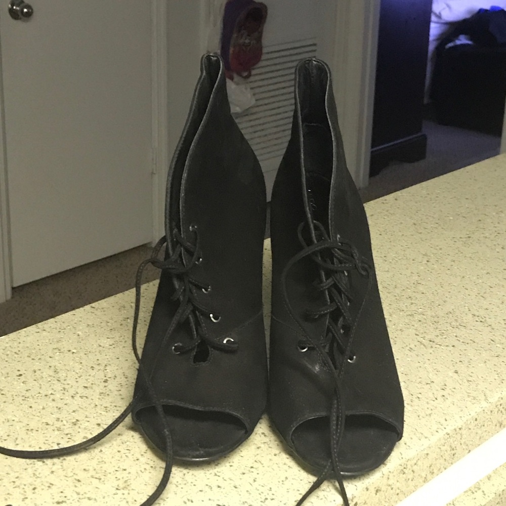 Also black peep toe boots.