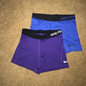 2 pair of Nike (size L) spandex!
