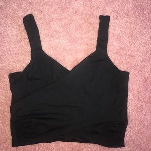 Bebe crop tank top in black extra small