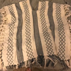 Grey and off white poncho.