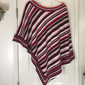 Asymmetrical striped poncho.