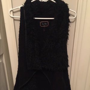 Black fur vest with pockets. Size small