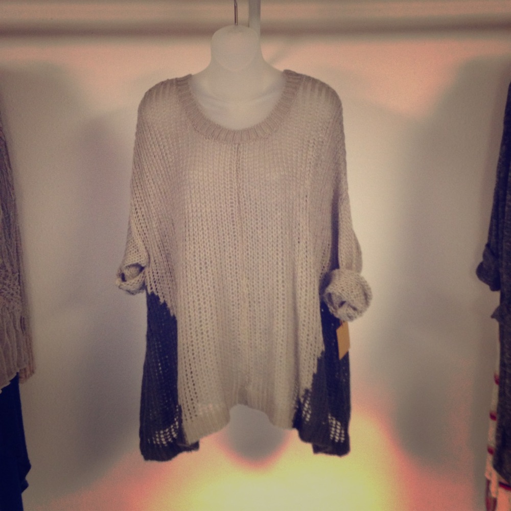 New with tags! Loose knit high low sweater