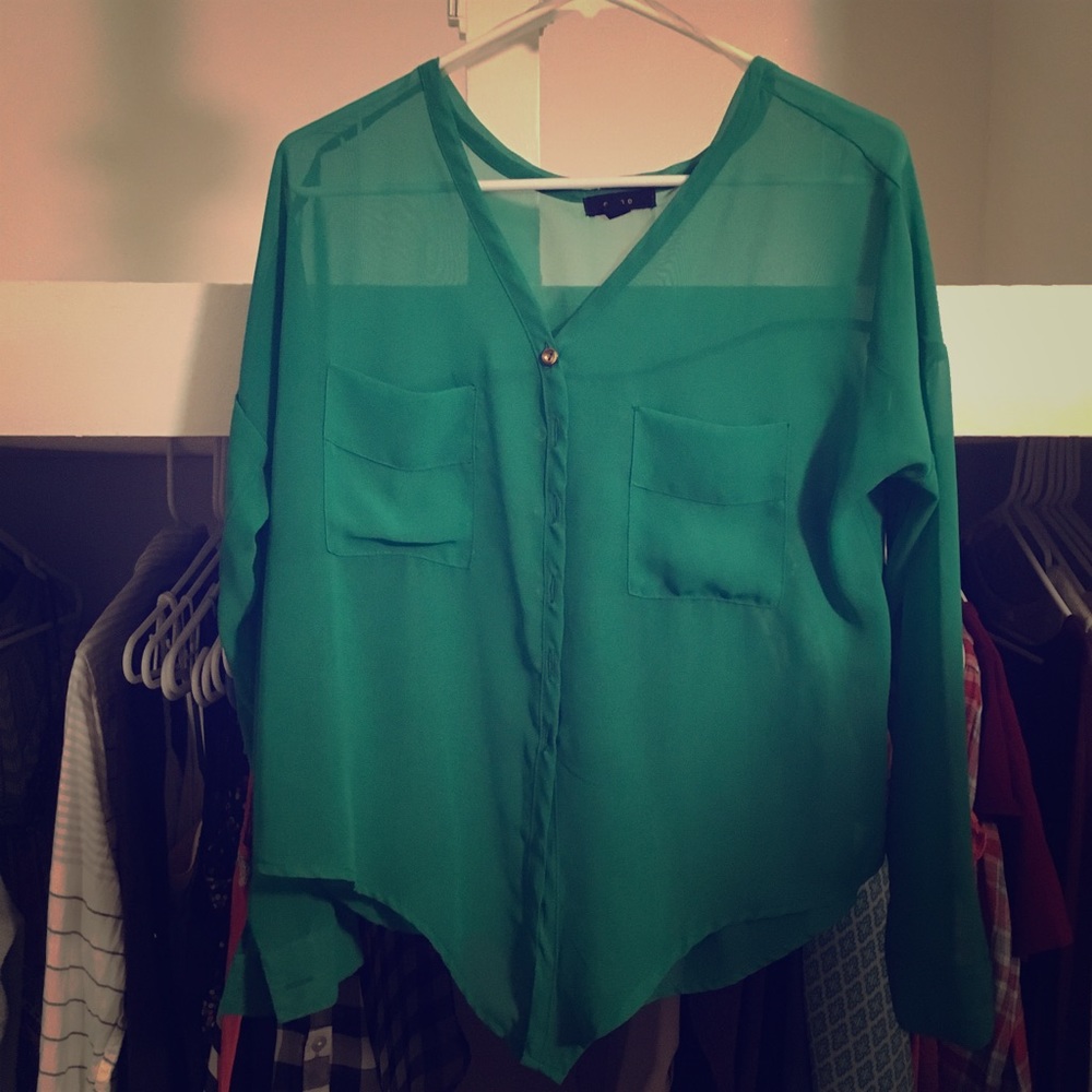 Sheer light green long sleeve top.