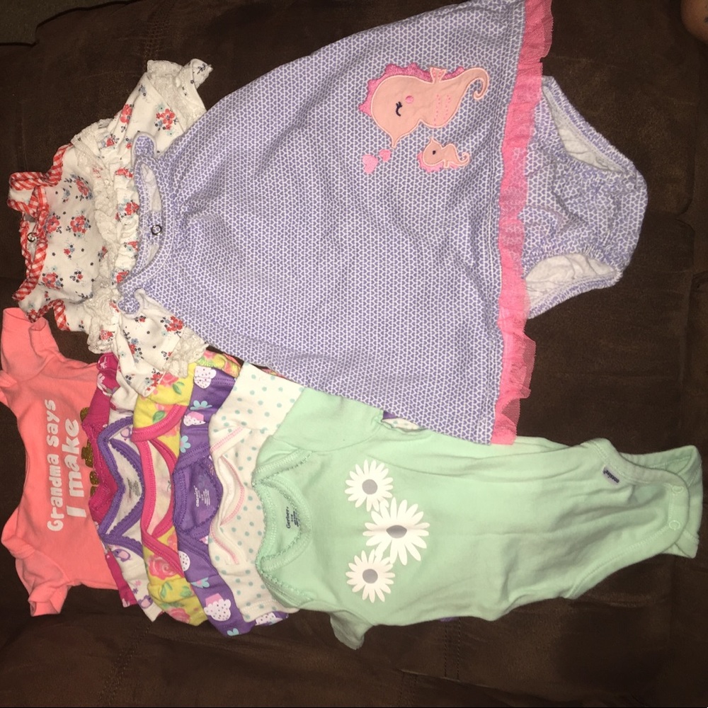 Size 0-3 onesies and two outfits!