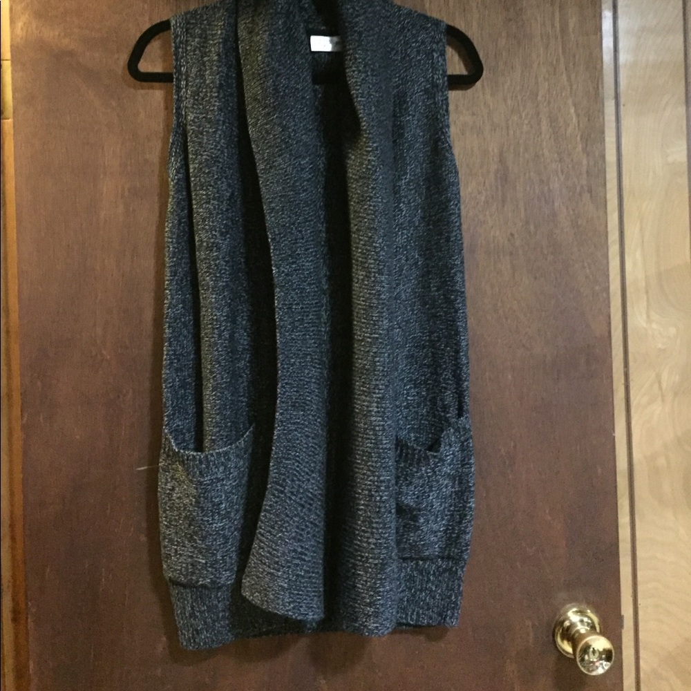 RD Style vest. Shawl collar, hooded with pockets.