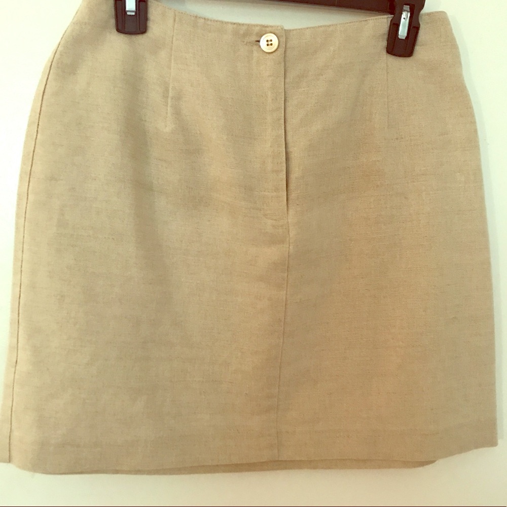 Tweed and cotton 2 pocket mini skirt.