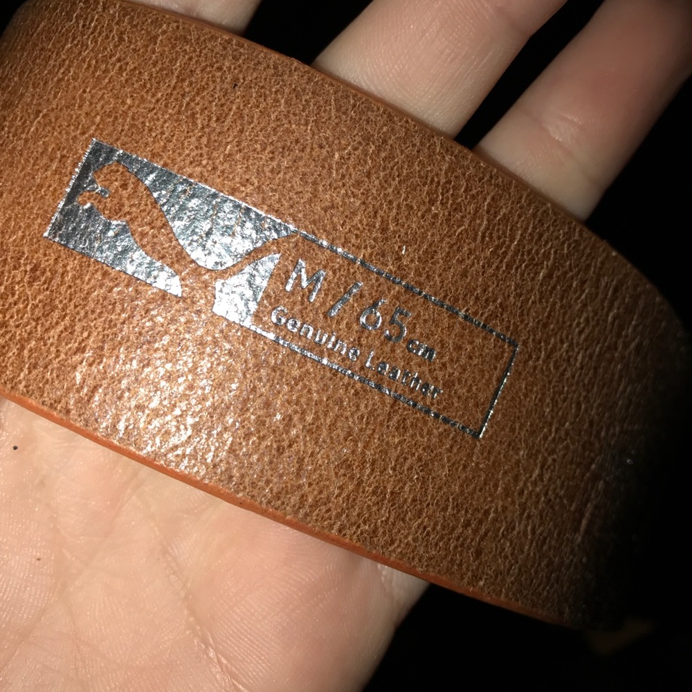 Puma orange leather belt silver buckle sorta heavy