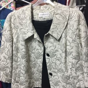 Elegant skirt suit. Head turner at any occasion.