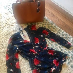 Floral Romper - Ruffle Hem. Navy Blue in color