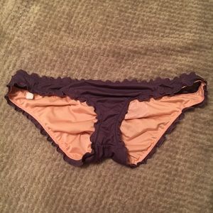Victoria's Secret purple swim bottom (size m)