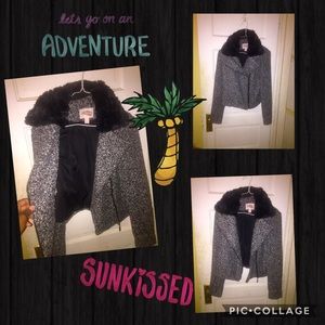 Black wool jacket with fur around collar