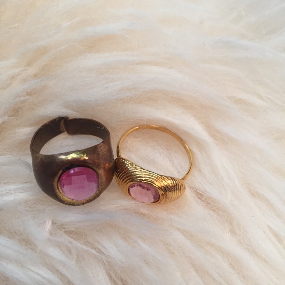 2 assorted rings with pink gems