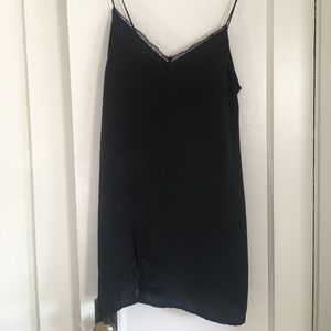 Black slip dress with lace slit detail