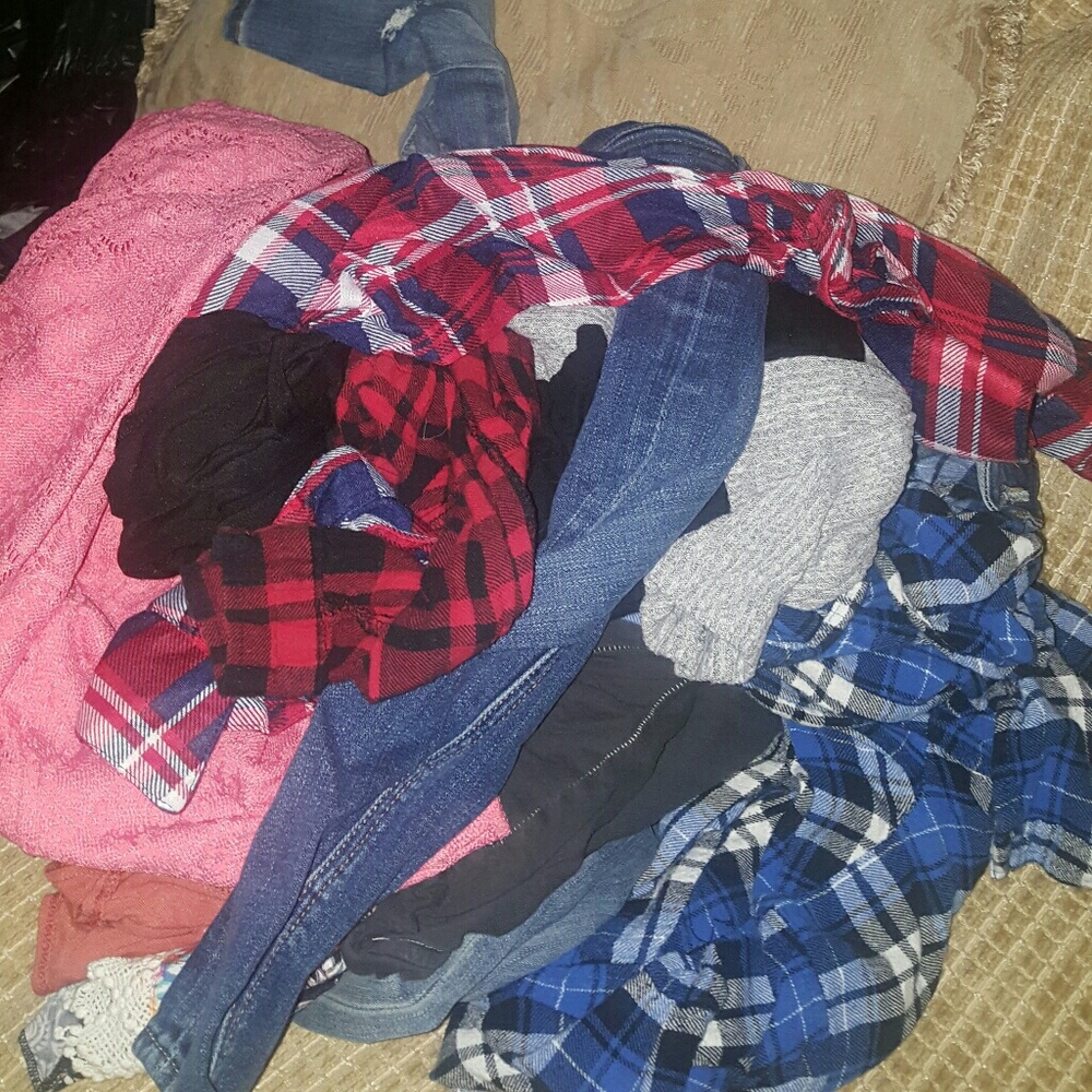Tons of clothes. A whole trash bag and a half full