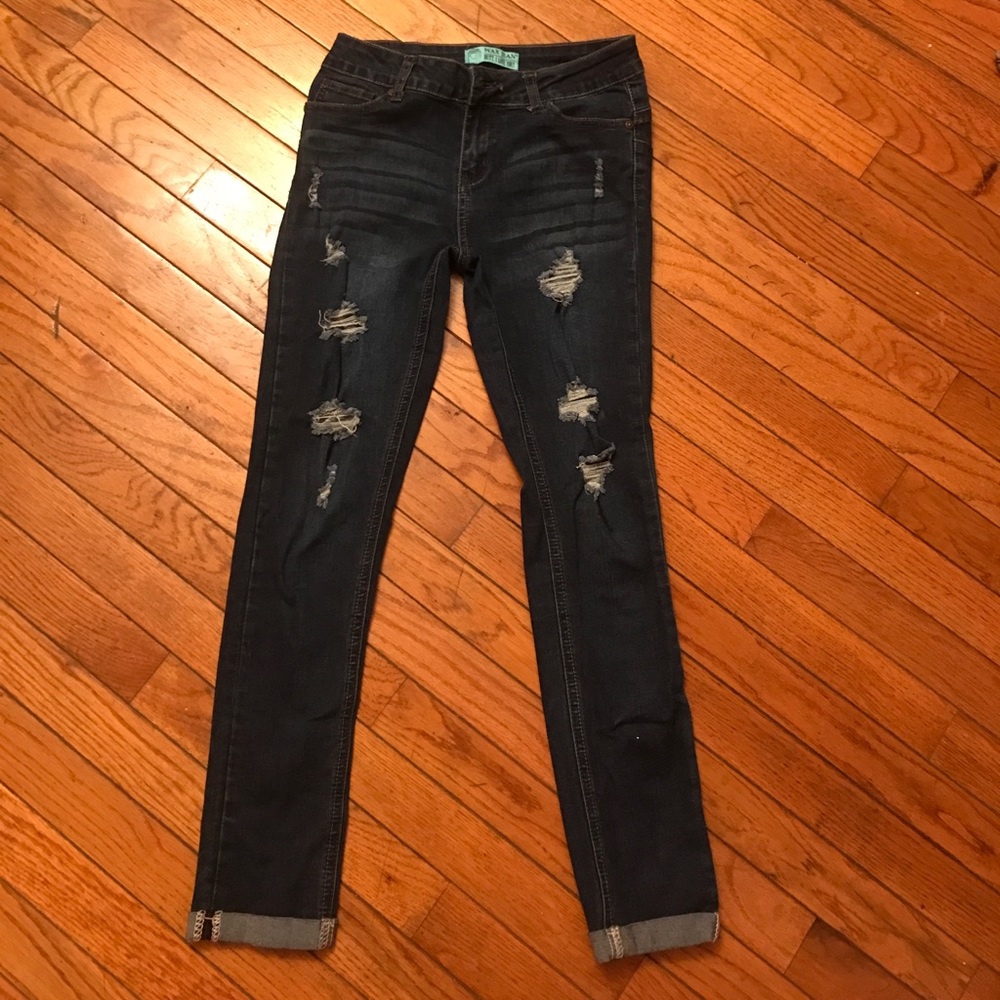 Ripped and cuffed skinny jean