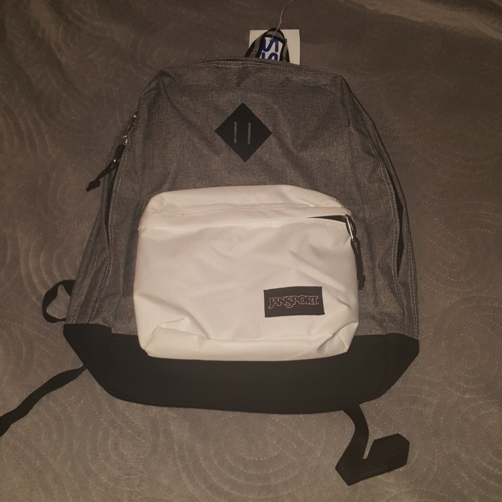 Gray, black, and white jansport backpack