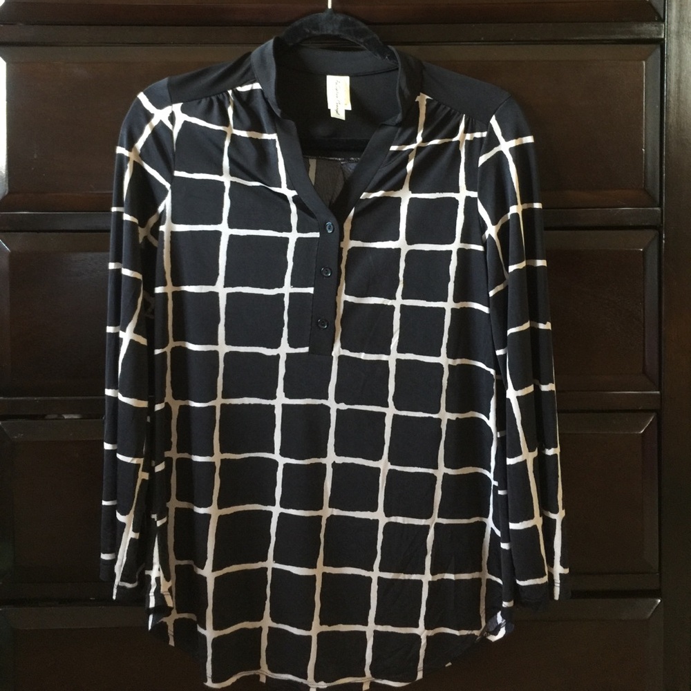 Black & Beige soft material blouse.
